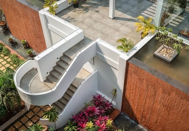 Aerial view of a staircase and rooftop terrace at one of the managed properties